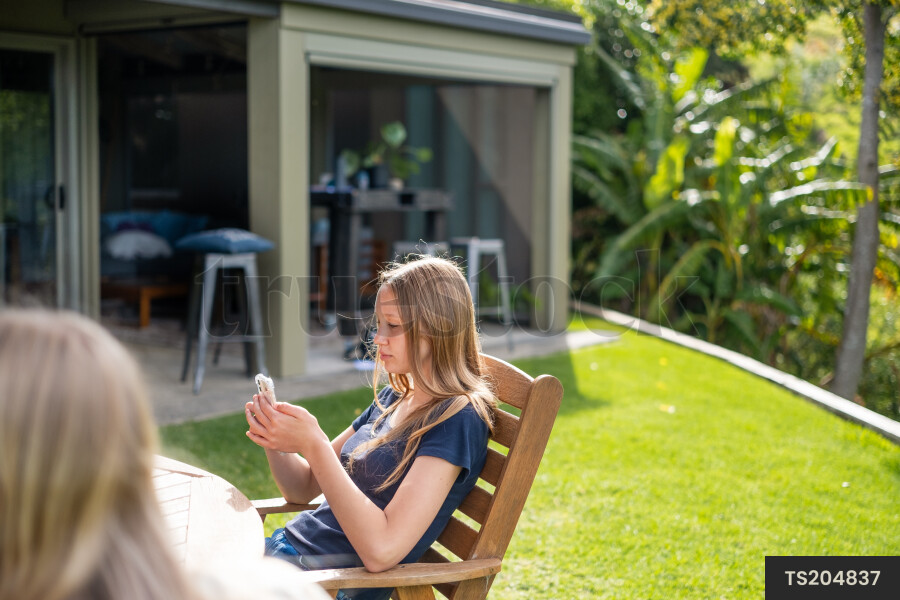 Family at Table Outside