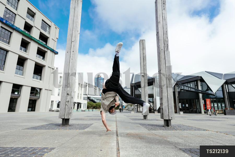 Young man breakdancing in Wellington