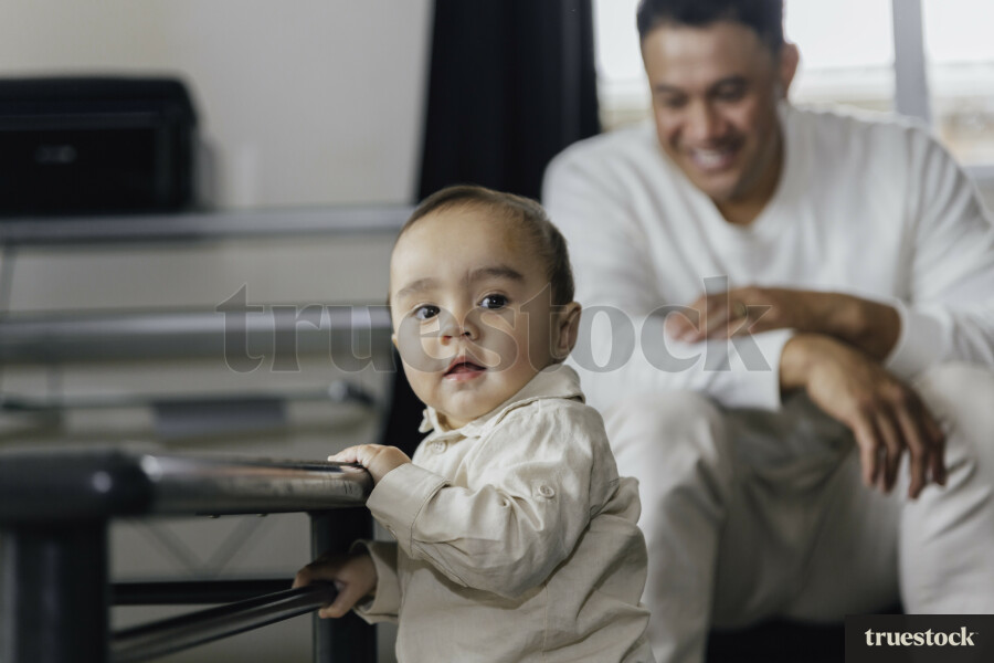 Father Watching Baby