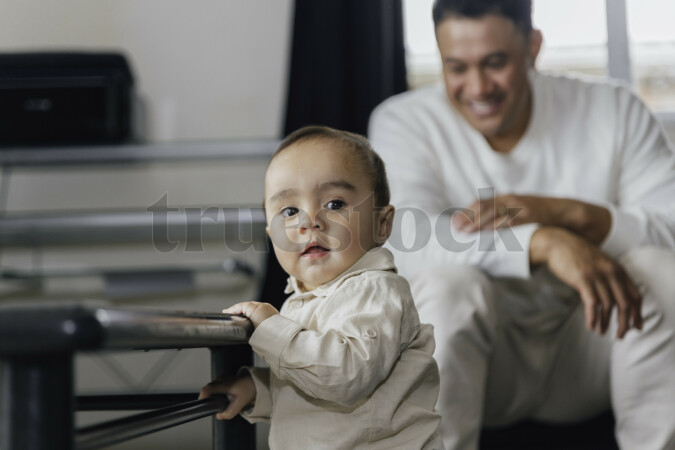 Father Watching Baby