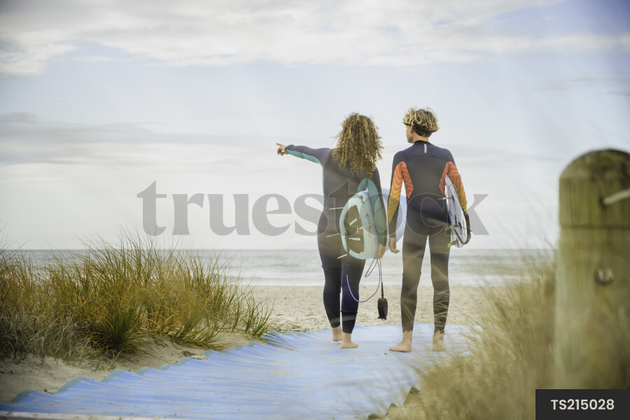 Teen Surfers at Beach