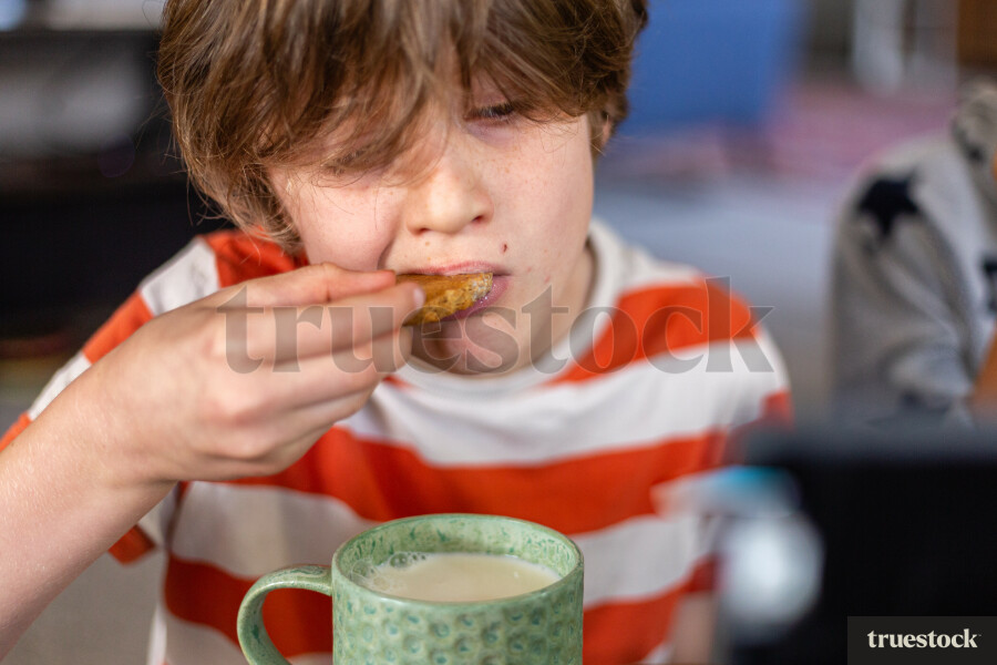 Child eating a biscuit