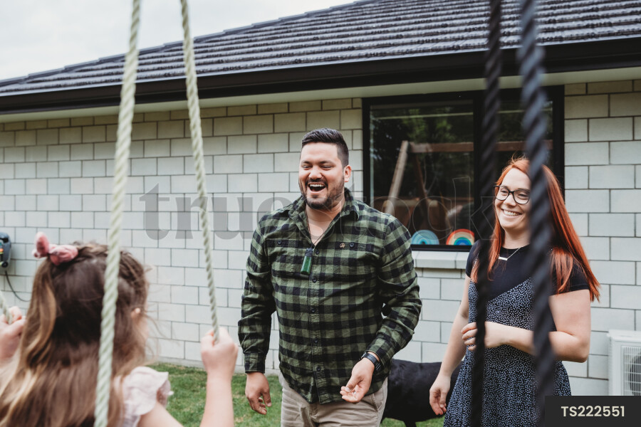 Young Girl on Playground and Swing