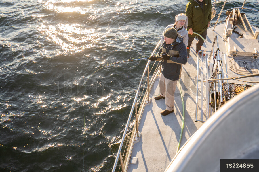 People fishing on boat
