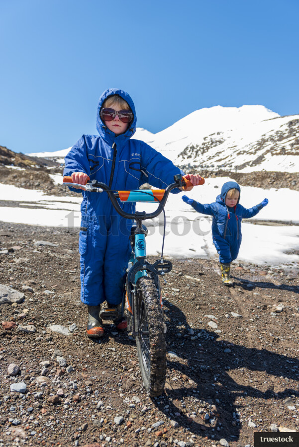 Young Boy with Bicycle