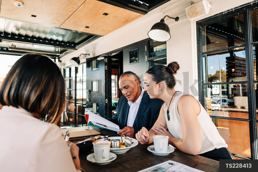 Businesspeople meeting at cafe