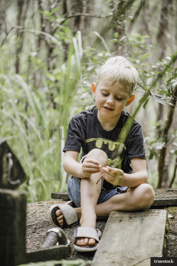 Young Boy in Forest