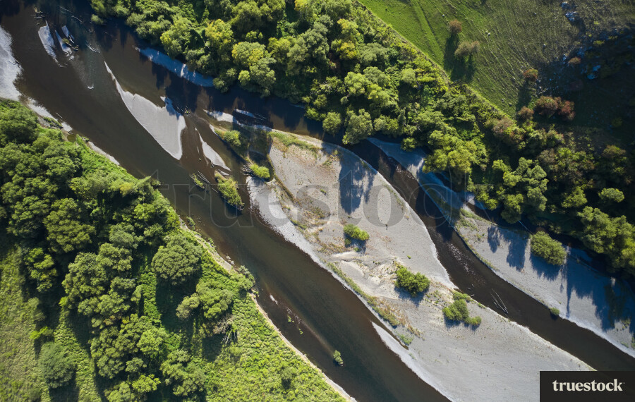 River Surrounded by Forest and Farmland