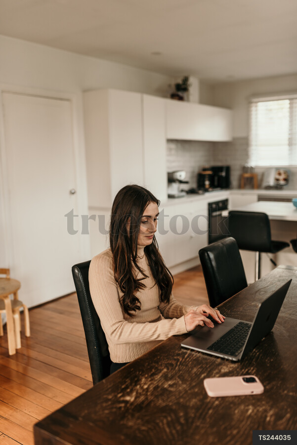 Mother Using Laptop