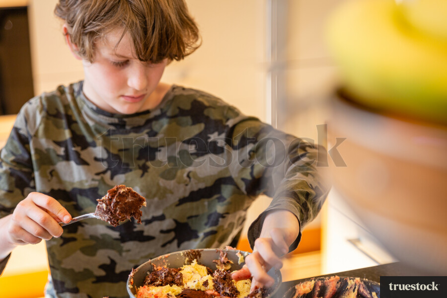 Child baking a cake