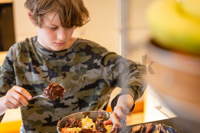Child baking a cake