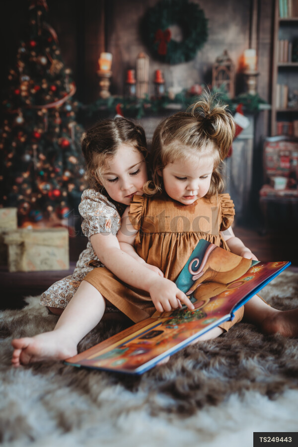 Sisters Reading Book