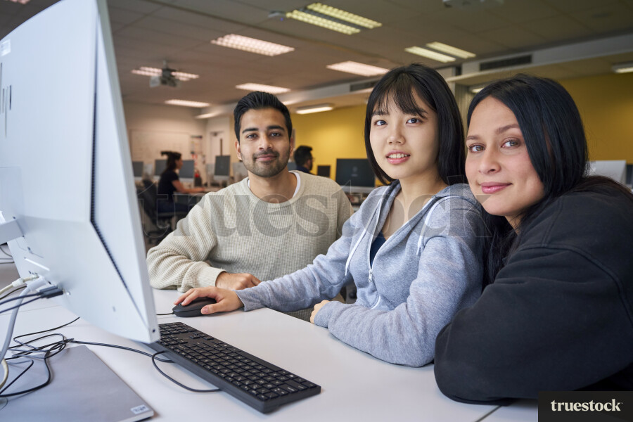 Students Using Computer at University