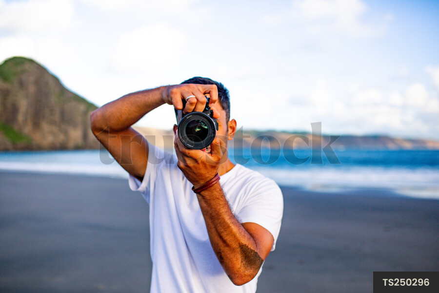Photographer on beach
