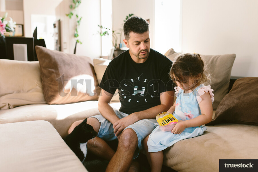 Dad and Daughter on couch