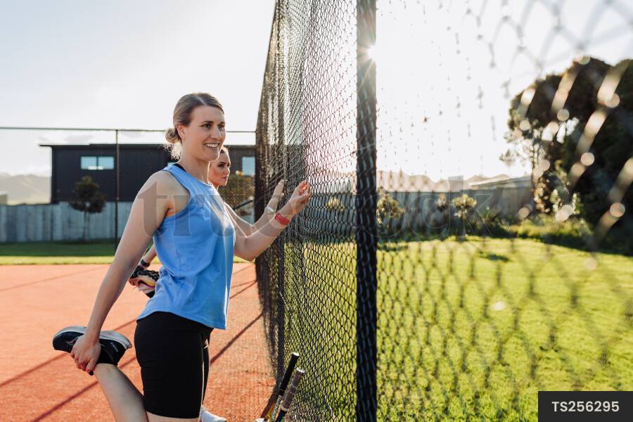 Women Stretching Before Tennis