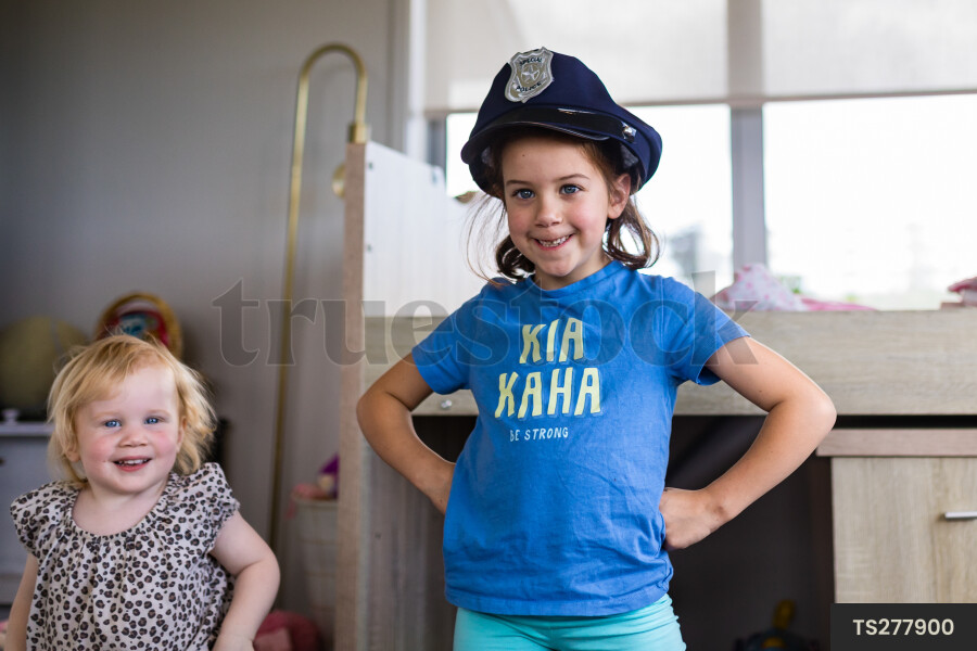 Young Girl in Police Hat