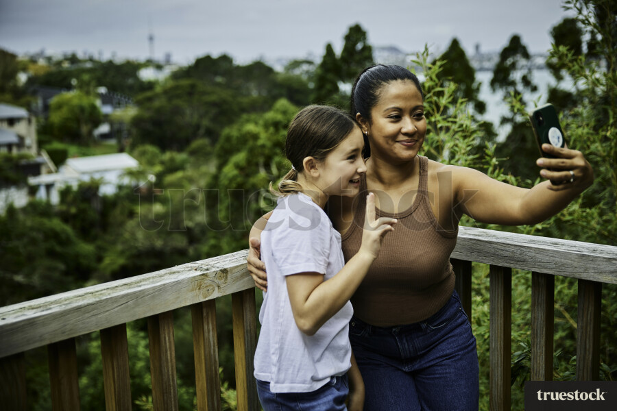 Mother and Daughter Taking a Selfie