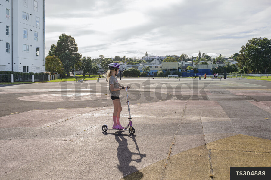 Young Girl on Scooter