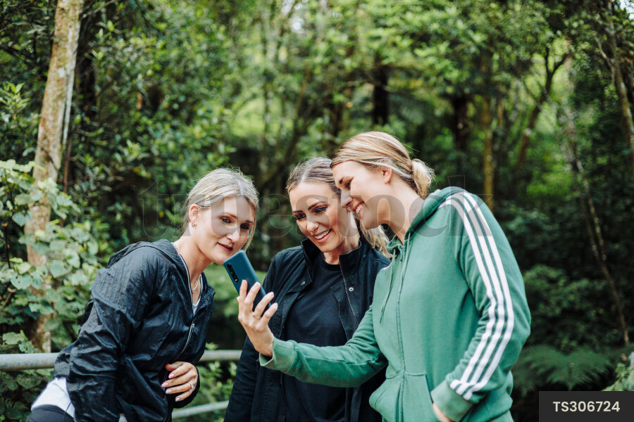 Women using Phone on Hike