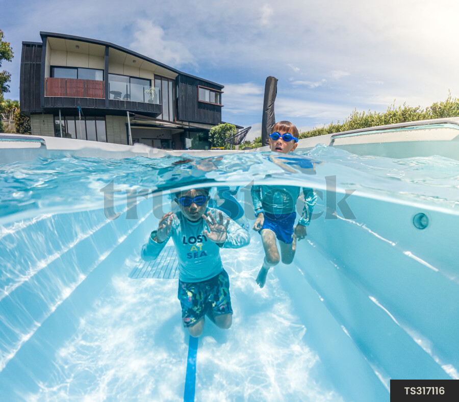 Kids Swimming in Pool