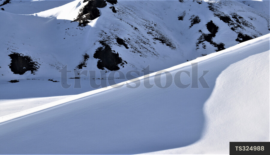 Aerial view of snow on mountain range in Mount Aspiring National Park