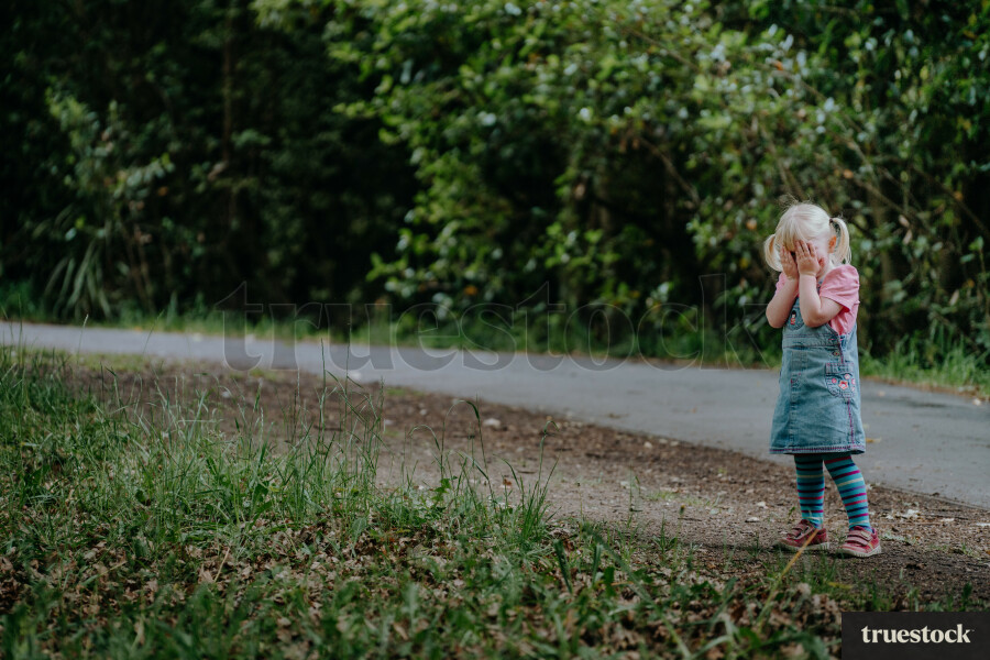 Girl crying in park