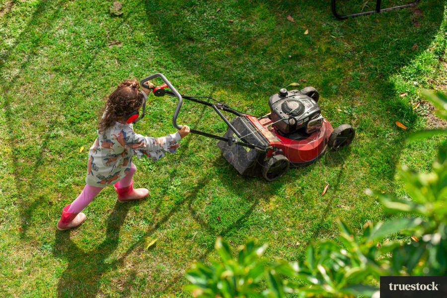 Child lawn mowing