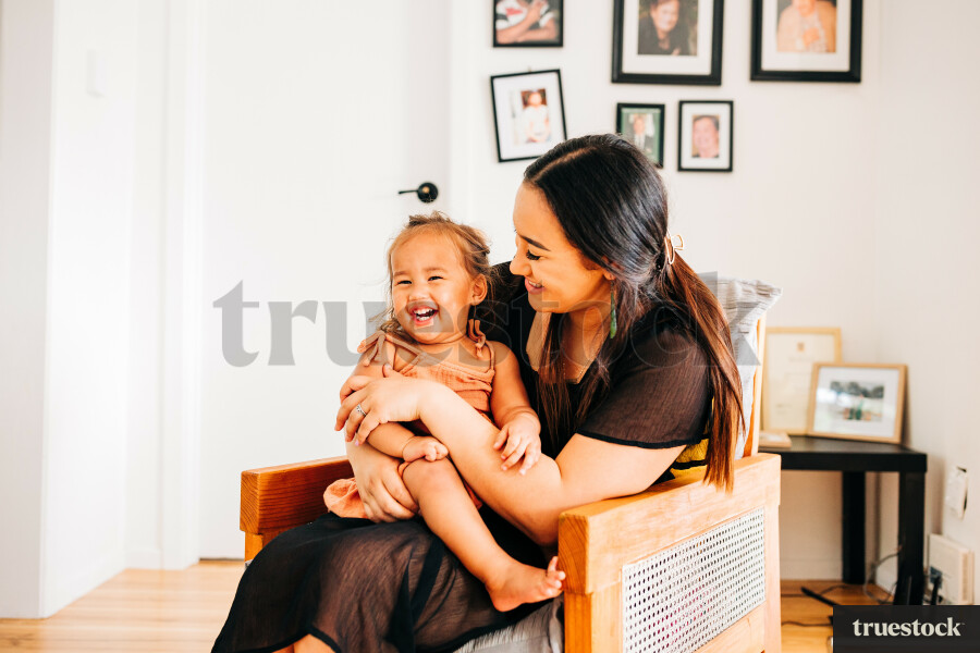 Māori mum and daughter in their home