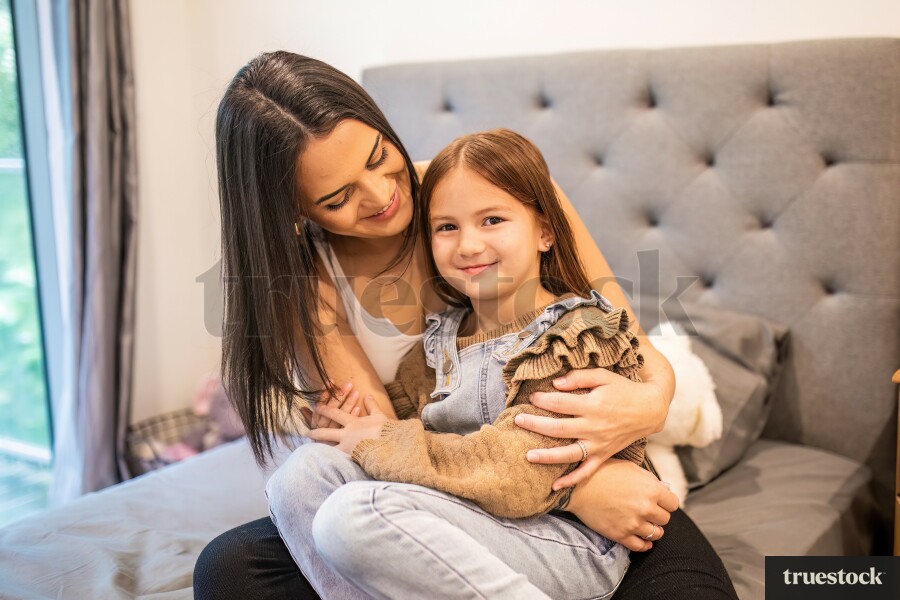 Mother Holding Daughter