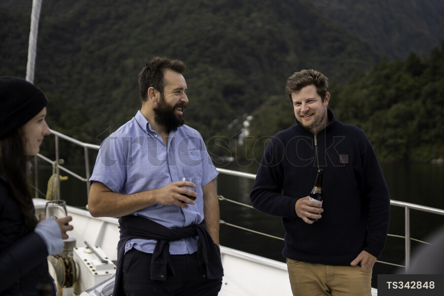 Tourists Enjoying Wine on a Boat