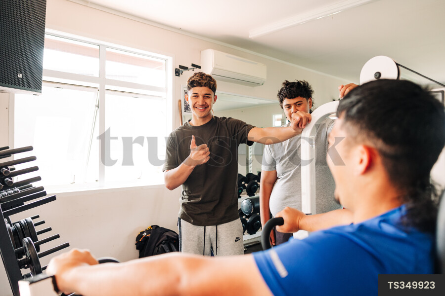 Teenagers Working Out at Gym