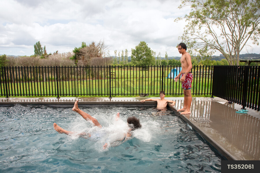 Teens Playing in Pool