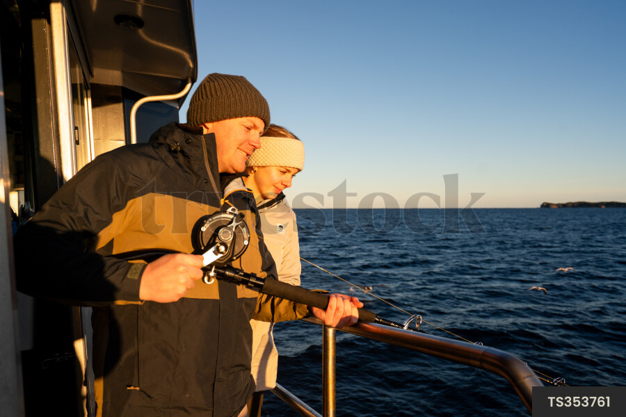 People fishing on boat