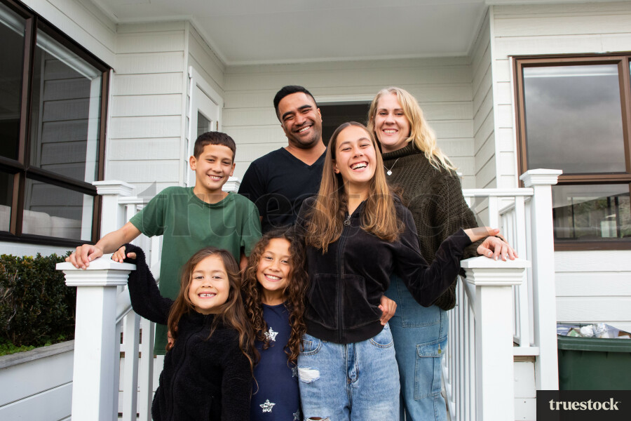 Family Photo Outside Front Door