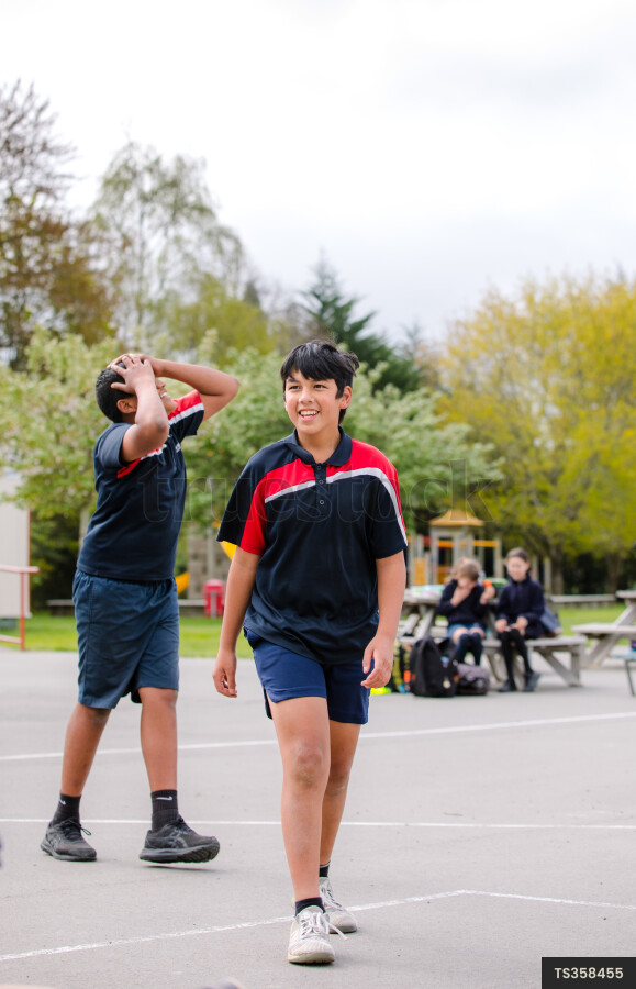 Kids Playing Basketball on Break