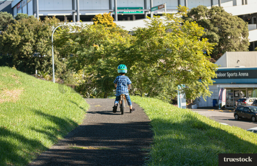 Child going for a bike ride on a pushbike