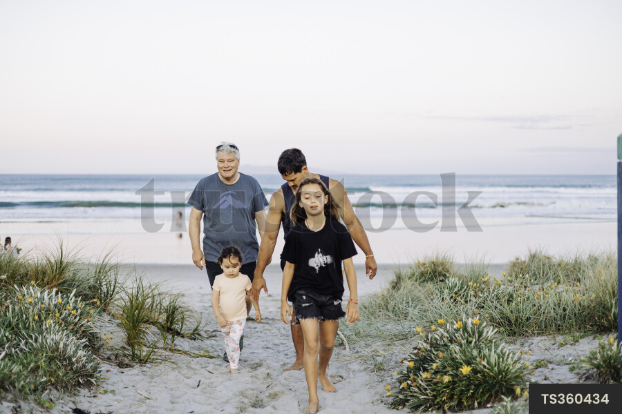 Family Walking on Beach