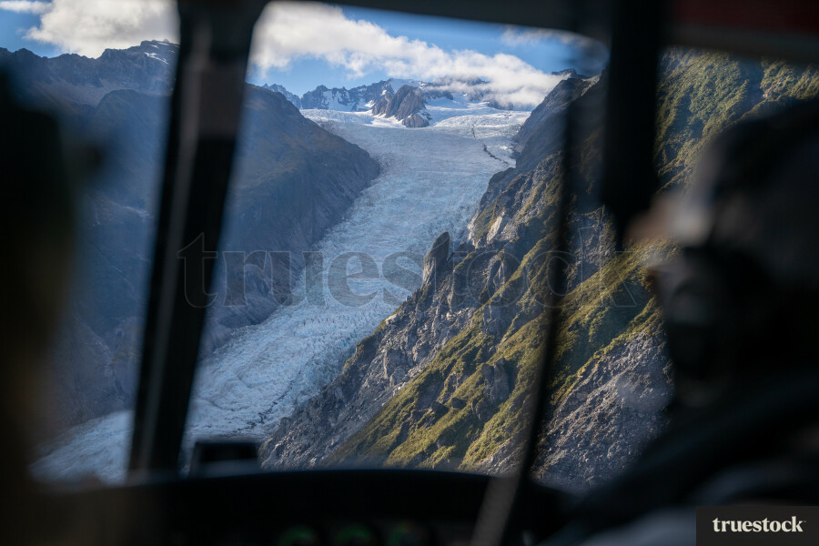 Helicopter flight over the mountains