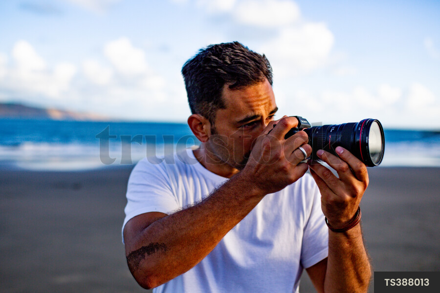 Photographer on beach