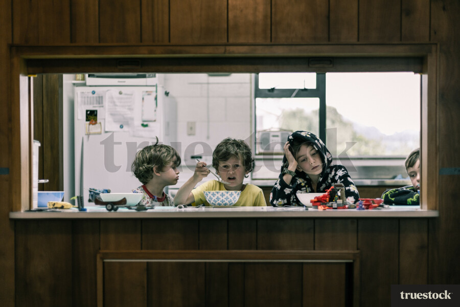 Children in the kitchen for breakfast