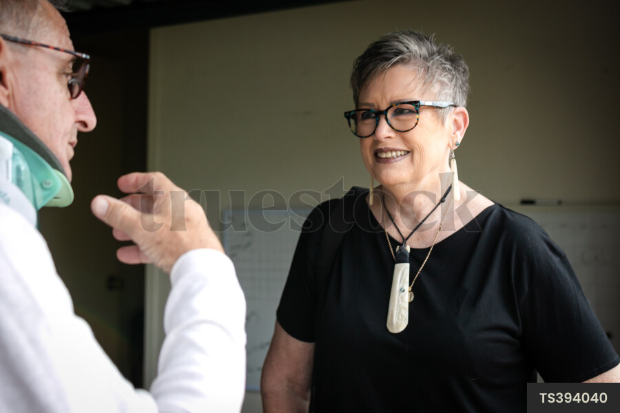 Health carer with patient in garage