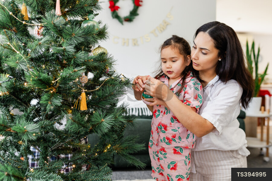Family Decorating Christmas Tree