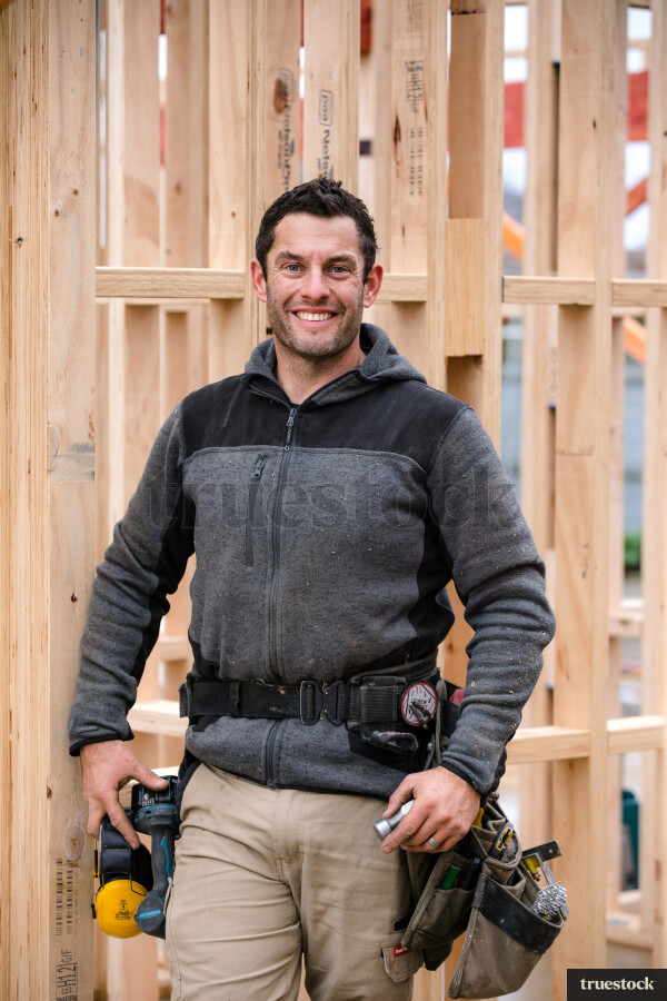 Builder onsite working on a new suburban house build