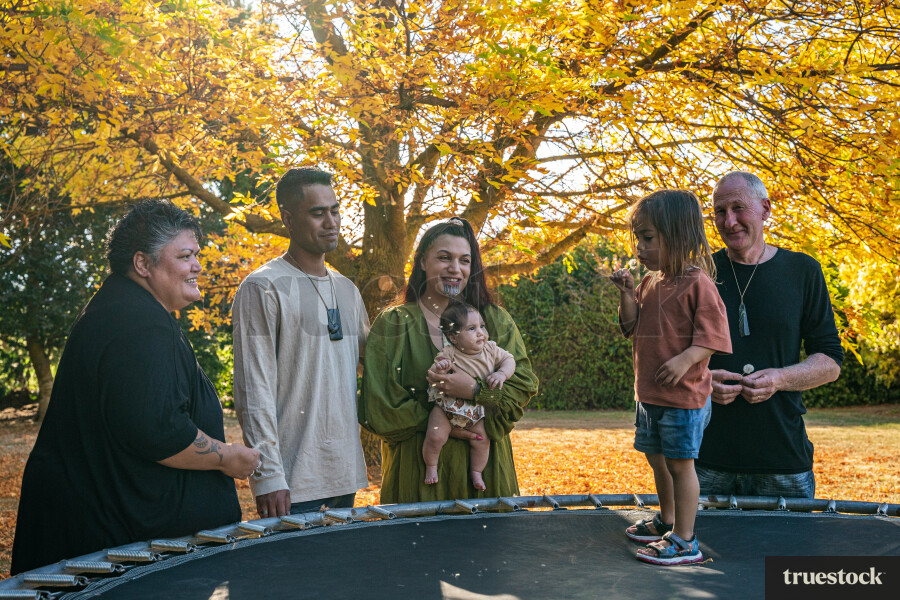 Child Playing on Trampoline