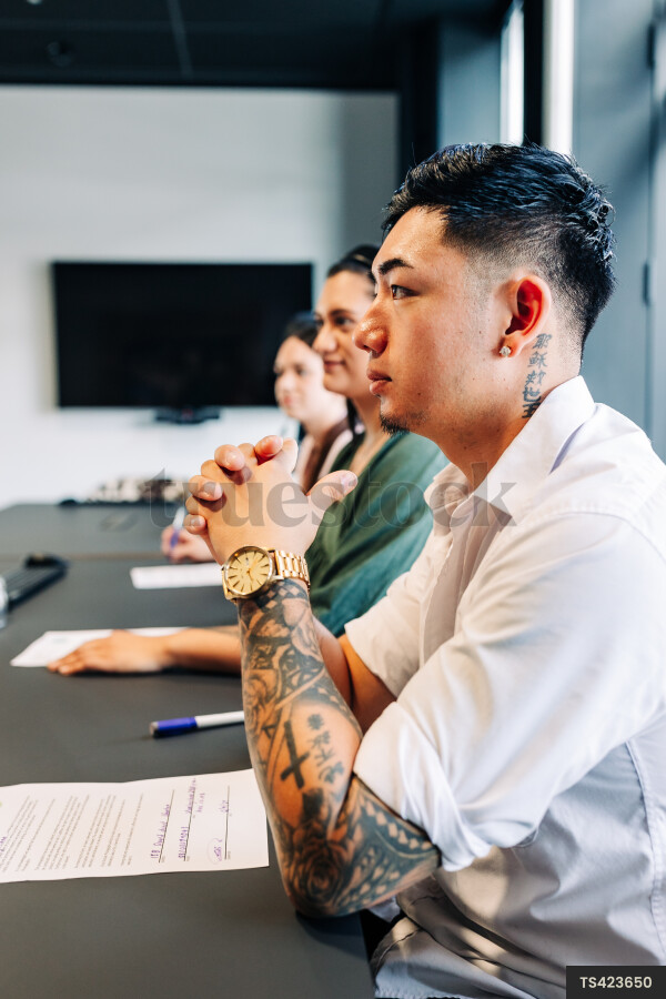 Businesspeople during meeting in boardroom