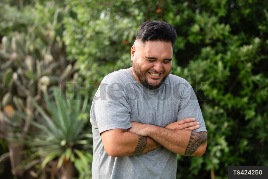Man laughing in garden