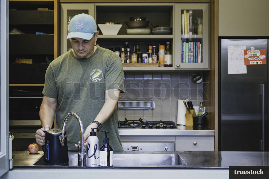 Man Filling the Kettle