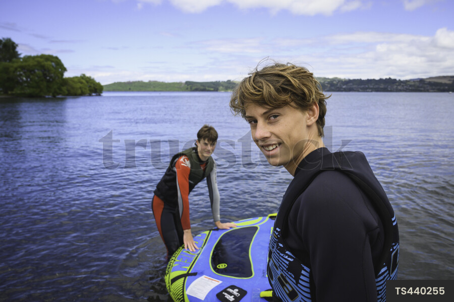 Teenage boys biscuiting on Lake Taupo