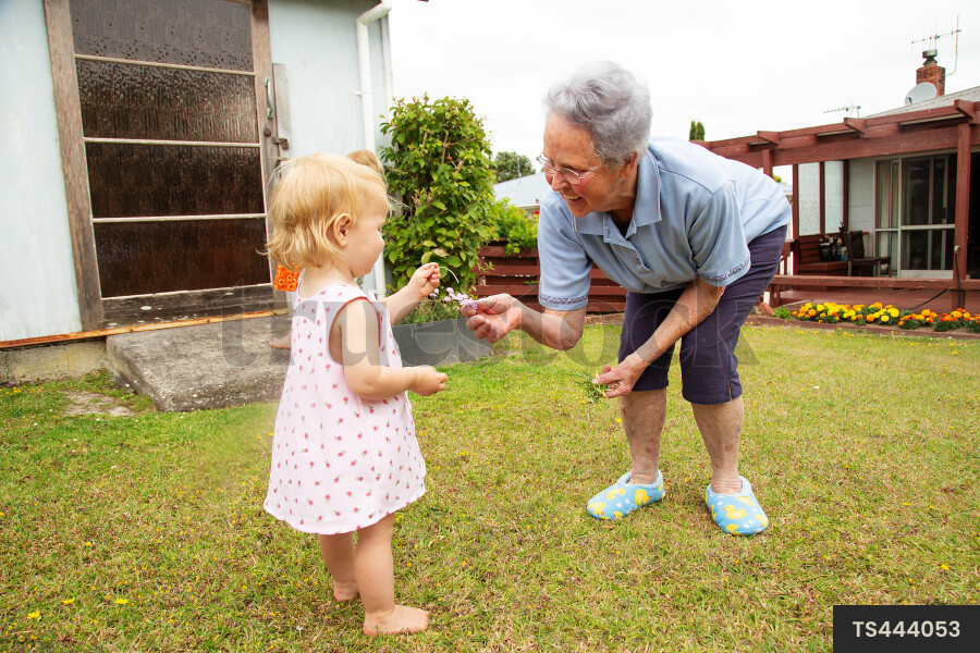 Woman playing with her granddaughter